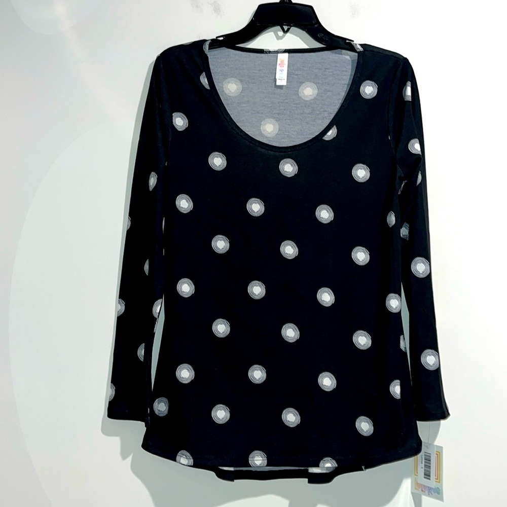 - Lularoe black white semi sheer top. Size small. NWT.